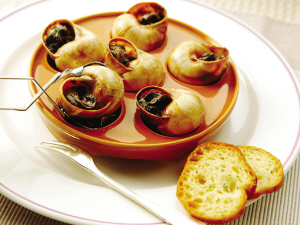 用黄油烘烤的蜗牛是法国大餐的招牌菜